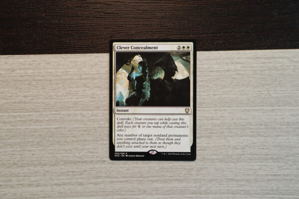 Clever Concealment #005 Phyrexia: All Will Be One Commander (ONC) hologram