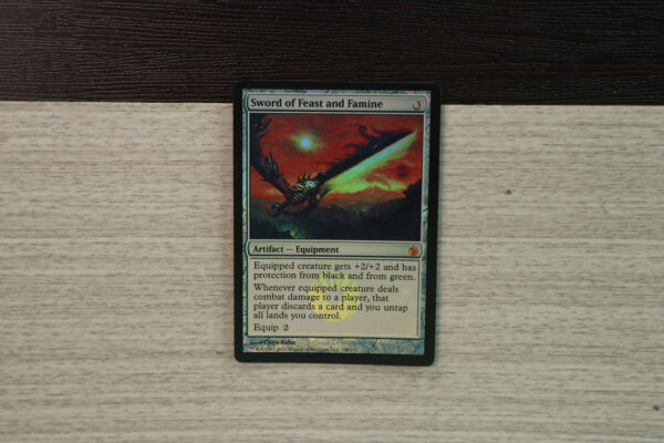 Sword of Feast and Famine Mirrodin Besieged foil